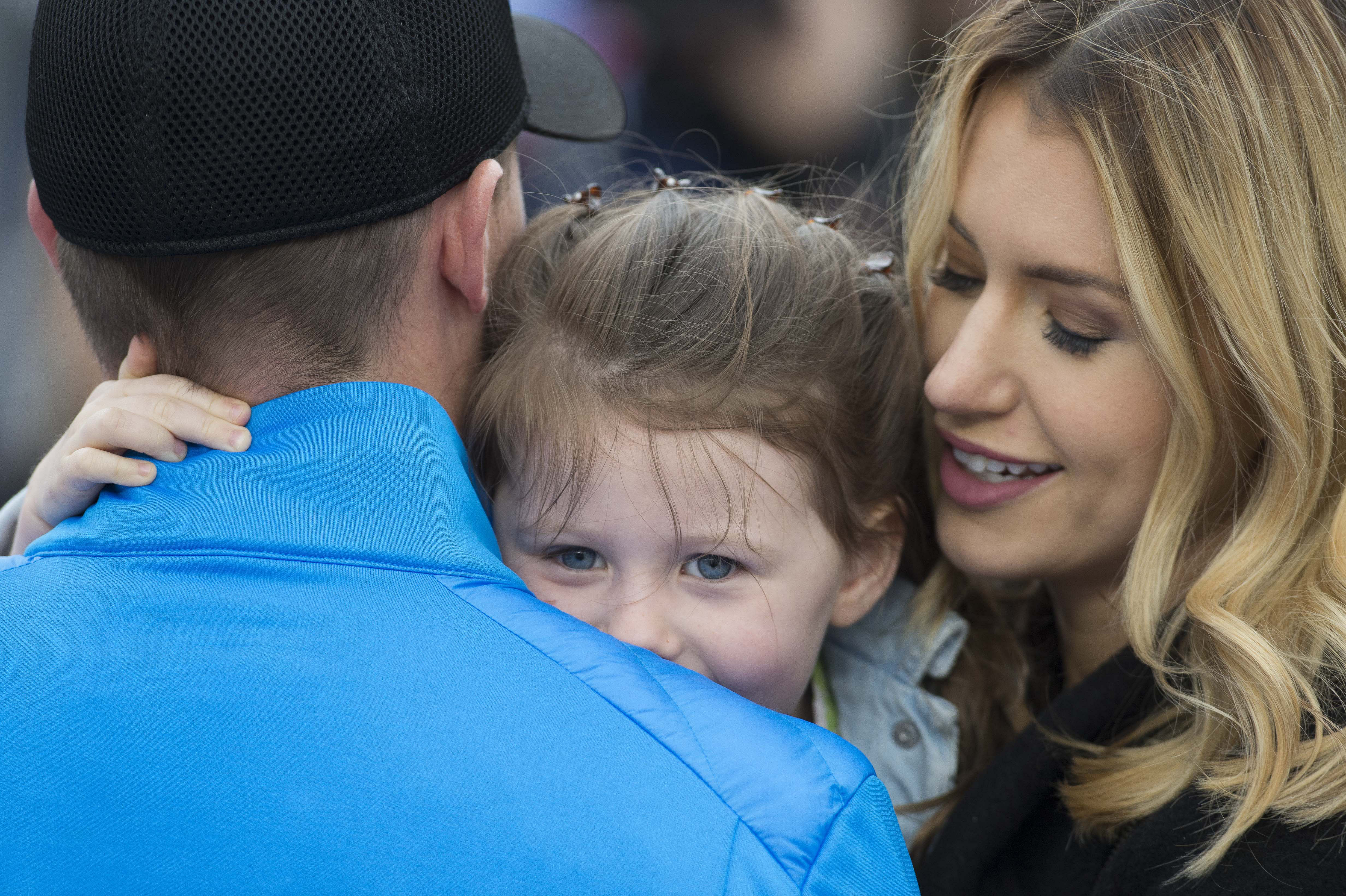 Taylor hugs her father Denny Hamlin and mother Jordan Fish before the Duck Commander 500 at Texas. Source: Imagn